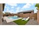Backyard pool area with artificial turf, lounge chair and desert landscaping at 23434 N 76Th Way, Scottsdale, AZ 85255
