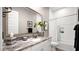 Bright bathroom featuring granite countertops and a modern vanity at 23434 N 76Th Way, Scottsdale, AZ 85255
