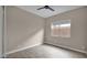 Bedroom with neutral walls, window with bright natural light, and hardwood floors at 23434 N 76Th Way, Scottsdale, AZ 85255