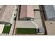Aerial view of the property showcasing the backyard, patio, and surrounding neighborhood at 235 S San Gregorio Ln, Casa Grande, AZ 85194