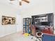 Bedroom features desk space and a hutch and a display of interesting decorative pieces at 235 S San Gregorio Ln, Casa Grande, AZ 85194