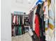 Spacious walk-in closet with ample shelving and hanging space for optimal organization at 235 S San Gregorio Ln, Casa Grande, AZ 85194