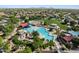 A vibrant community pool with slides, shaded seating and well-maintained landscaping at 235 S San Gregorio Ln, Casa Grande, AZ 85194