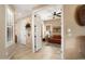 Open hallway leading to a living area with neutral tones and a bright, airy feel at 27280 N Makena Pl, Peoria, AZ 85383
