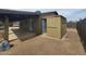 Backyard with a shed and an outdoor covered patio at 2833 E Emile Zola Ave, Phoenix, AZ 85032