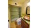 Updated bathroom with a unique copper sink and a modern walk-in shower at 2833 E Emile Zola Ave, Phoenix, AZ 85032