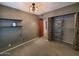 Bedroom with shelving unit and closet at 2833 E Emile Zola Ave, Phoenix, AZ 85032