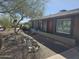 Beautiful single-story home featuring desert landscaping and a warm, inviting entrance with wood door at 2833 E Emile Zola Ave, Phoenix, AZ 85032
