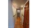 Hallway with brick flooring and lighting that shines along the wall for decor at 2833 E Emile Zola Ave, Phoenix, AZ 85032