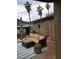 Cozy patio with plush outdoor seating, an umbrella, and privacy, perfect for relaxing at 2833 E Emile Zola Ave, Phoenix, AZ 85032