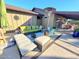 Inviting patio area with comfortable seating, a fire pit, and a cozy atmosphere at 2833 E Emile Zola Ave, Phoenix, AZ 85032