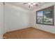 Spare bedroom with a window letting in natural light and neutral carpet at 3023 E Silversmith Trl, San Tan Valley, AZ 85143