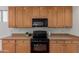 Kitchen features stainless steel appliances and built-in microwave and plenty of cabinet storage at 3023 E Silversmith Trl, San Tan Valley, AZ 85143