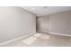 Spacious room with tile floor, baseboards, and large, neutral walls at 30323 W Sheila Ln, Buckeye, AZ 85396