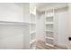 Walk-in closet with custom shelving offering ample storage space at 3437 E Acoma Dr, Phoenix, AZ 85032