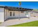 Outdoor patio area featuring a covered ceiling, artificial turf, and pavers at 3437 E Acoma Dr, Phoenix, AZ 85032