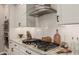 The kitchen features granite countertops, stainless steel appliances, and white subway tile backsplash at 36053 N Stoneware Dr, Queen Creek, AZ 85140
