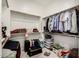 Spacious walk-in closet with ample shelving and hanging space for organized storage at 3842 E Bartlett Way, Chandler, AZ 85249