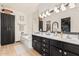 Spacious bathroom with double sinks, vanity, tub, and lots of storage space at 3917 E Des Moines St, Mesa, AZ 85205