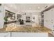 Spacious kitchen with an island, granite countertops, and stainless steel appliances at 3917 E Des Moines St, Mesa, AZ 85205
