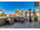 Outdoor patio featuring comfortable wicker seating, a stylish brick floor, and a cozy ambiance at 3917 E Des Moines St, Mesa, AZ 85205