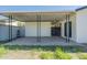 Covered back patio with concrete flooring, providing ample outdoor space for relaxing and entertaining at 4128 W Las Palmaritas Dr, Phoenix, AZ 85051