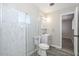 Updated bathroom with a glass enclosed shower, modern vanity, and tile flooring at 4128 W Las Palmaritas Dr, Phoenix, AZ 85051