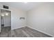 Bedroom featuring tile floors and an attached bathroom at 4128 W Las Palmaritas Dr, Phoenix, AZ 85051