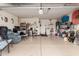 Spacious garage with ample storage and functional layout, ideal for parking and various projects at 42568 W Bunker Dr, Maricopa, AZ 85138