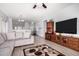 The open floor plan is perfect for entertaining at 45105 W Gavilan Dr, Maricopa, AZ 85139