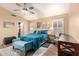 Inviting bedroom with a ceiling fan, shutters, and a walk-in closet at 4779 W Tulsa St, Chandler, AZ 85226