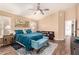 Bedroom with a ceiling fan, shutters, and comfortable furnishings at 4779 W Tulsa St, Chandler, AZ 85226