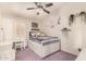 Bright bedroom featuring a platform bed with storage drawers, desk, and charming decor at 4779 W Tulsa St, Chandler, AZ 85226