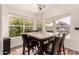 Bright dining area with lots of natural light and views of the backyard and outdoor grill at 4779 W Tulsa St, Chandler, AZ 85226