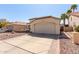 Beautiful home featuring desert landscaping, tile roof, and inviting outdoor seating, enhancing curb appeal at 4779 W Tulsa St, Chandler, AZ 85226
