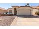 Inviting home exterior featuring a tile roof, drought-resistant landscaping, and a front patio seating area at 4779 W Tulsa St, Chandler, AZ 85226