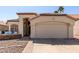 Charming home exterior with a tile roof, well-manicured landscaping, and a cozy front patio seating area at 4779 W Tulsa St, Chandler, AZ 85226