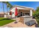 Covered patio area complete with a built-in barbeque, perfect for outdoor entertaining and relaxation at 4779 W Tulsa St, Chandler, AZ 85226