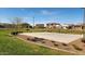 Community basketball court with landscaping, offering residents a place for recreation and outdoor activities at 5226 W Thresher Way, Laveen, AZ 85339