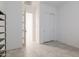 Bright bedroom with a neutral color scheme, tile floors and closet with sliding doors at 5226 W Thresher Way, Laveen, AZ 85339