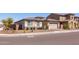Well-maintained one-story home with a two-car garage and desert landscaping at 5226 W Thresher Way, Laveen, AZ 85339