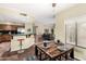 Dining area that opens to the living room and features a window with natural lighting at 53 W Pecan Pl, Tempe, AZ 85284
