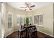 Bright breakfast nook with a ceiling fan, window views, and seating for four at 53 W Pecan Pl, Tempe, AZ 85284