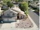 Aerial view of a two-story home with well-maintained landscaping and a three car garage at 53 W Pecan Pl, Tempe, AZ 85284