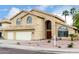 Charming two-story home with a two-car garage, desert landscaping, and a beautiful tile roof at 53 W Pecan Pl, Tempe, AZ 85284