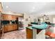 Spacious kitchen with stainless steel appliances, granite countertops, and ample cabinetry at 53 W Pecan Pl, Tempe, AZ 85284