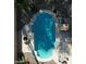 Aerial view of the private pool with built-in BBQ, bar seating, and desert landscaping at 53 W Pecan Pl, Tempe, AZ 85284