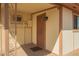 Covered porch entrance featuring decorative iron security door and classic architectural details at 5323 E Dodge St, Mesa, AZ 85205