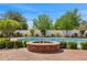 Backyard featuring a pool and firepit, surrounded by mature landscaping at 6231 E Calle Camelia --, Scottsdale, AZ 85251