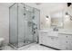 This bathroom showcases a glass-enclosed shower, white subway tile, and a stylish vanity area at 6231 E Calle Camelia --, Scottsdale, AZ 85251